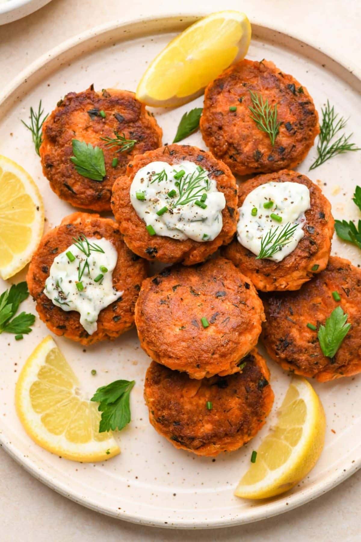 Scrumptious Gluten-Free Salmon Cakes on a pink tray.