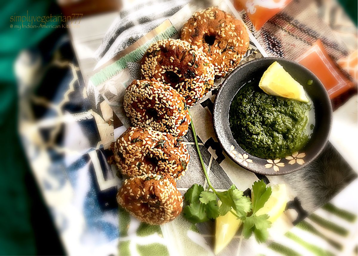 Crunchy Amaranth Flour Savory Dumplings next o a bowl of dip on a table.