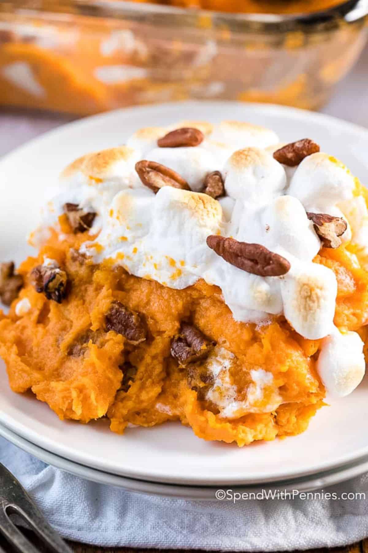 Scrumptious Sweet Potatoes on a white plate.