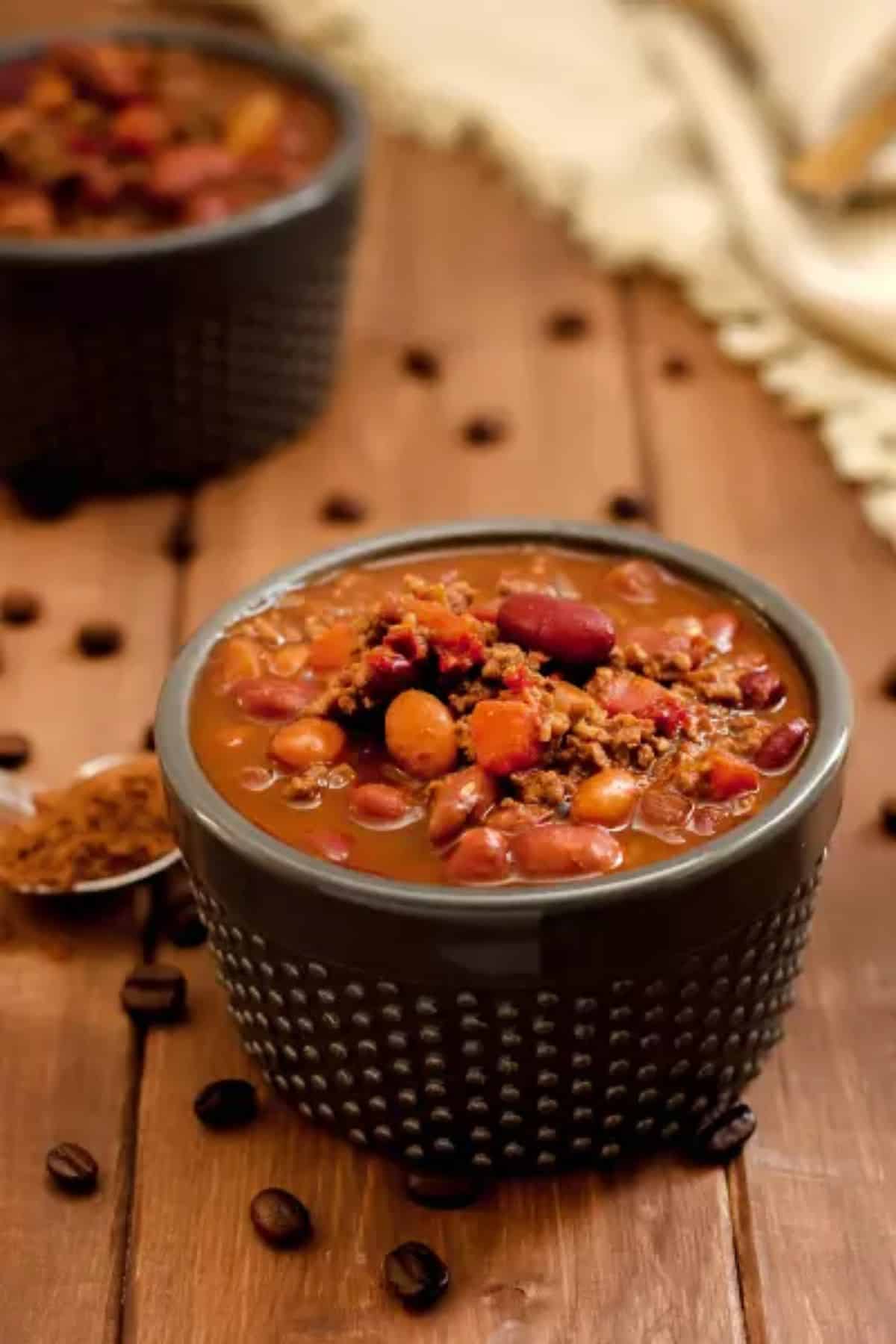 Delicious gluten-free Mole Chili in a black bowl.