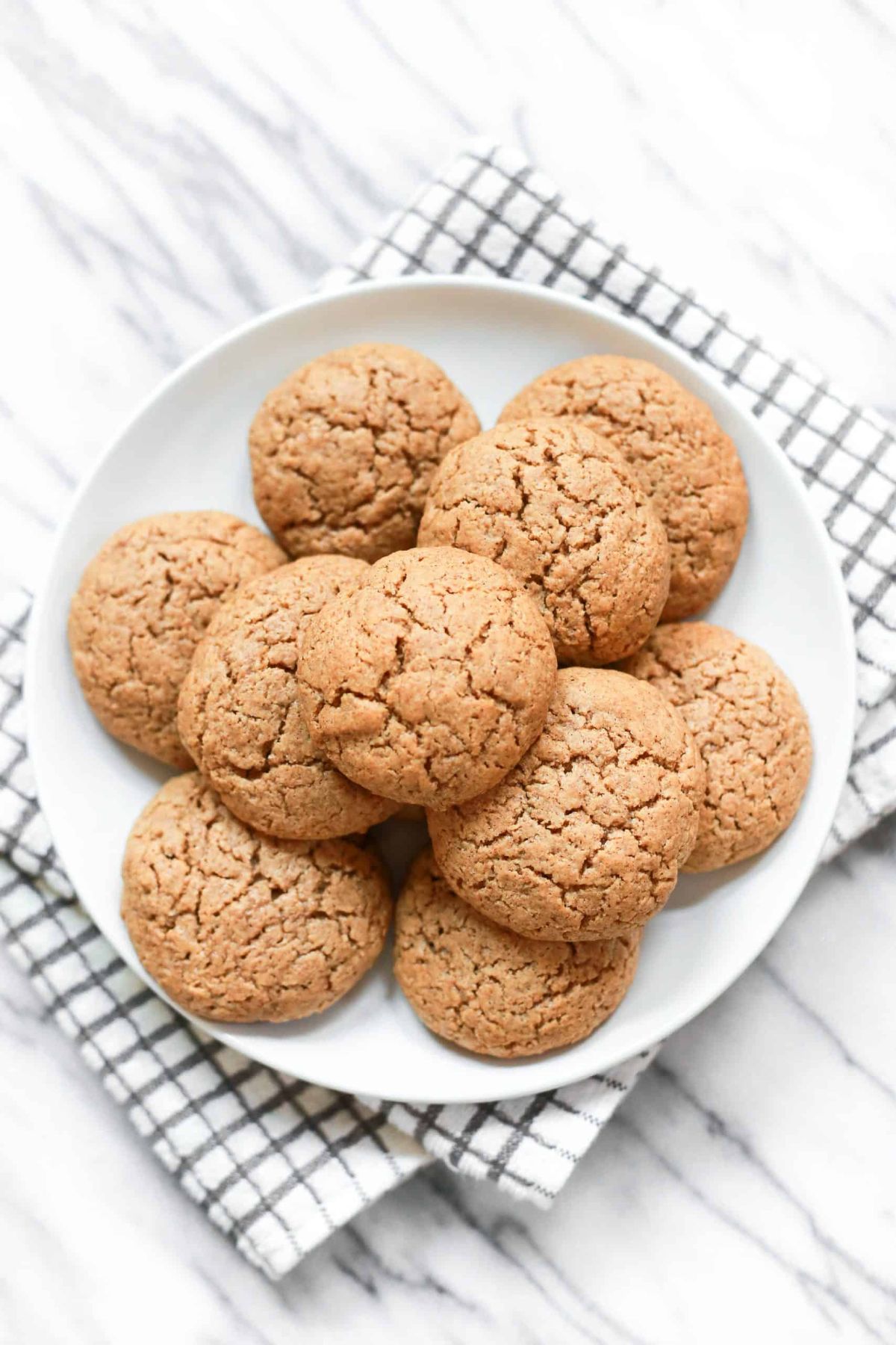 Crunchy Almond Butter Coconut Flour Cookies on a white plate.