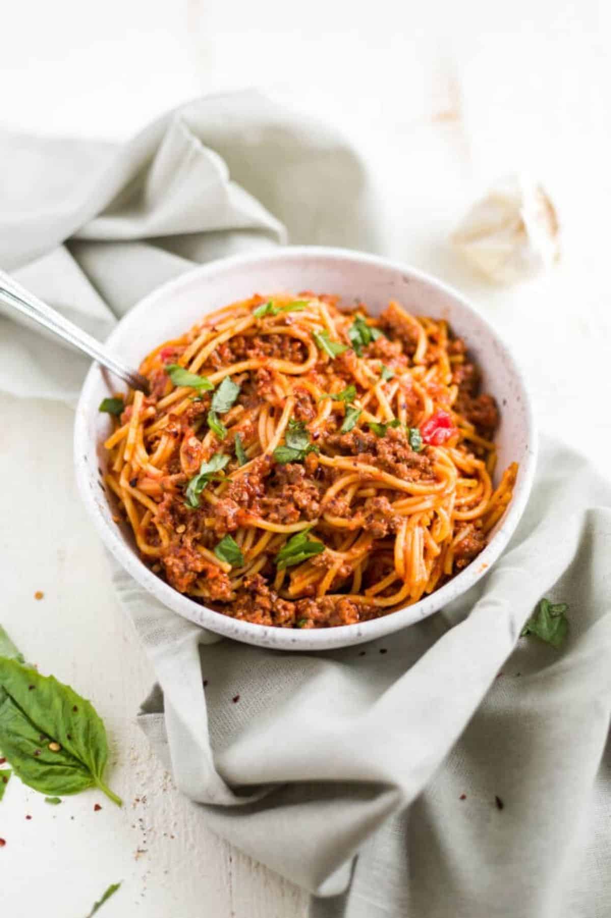 Delicious Instant Pot Spaghetti in a white bowl.