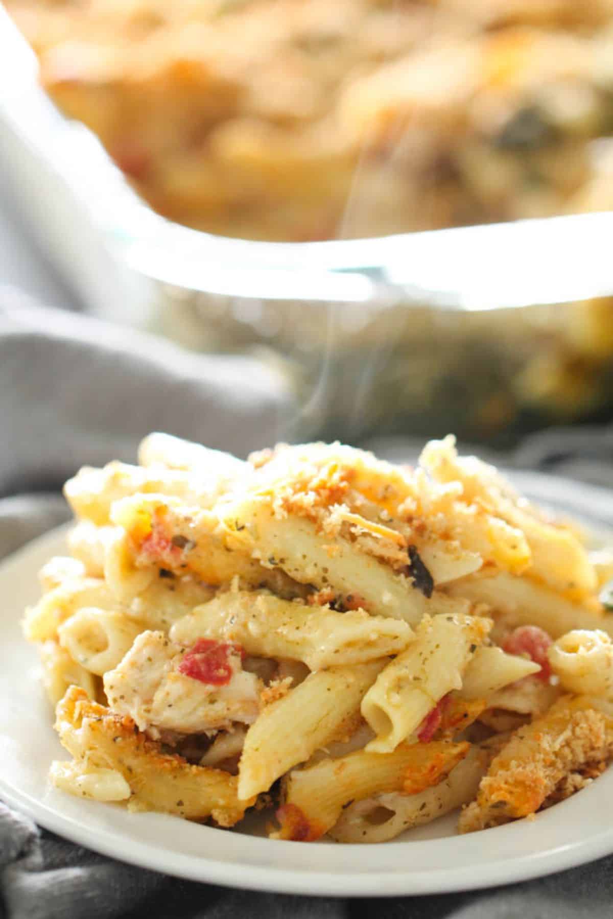 Delicious Pesto Chicken Pasta on a white plate.