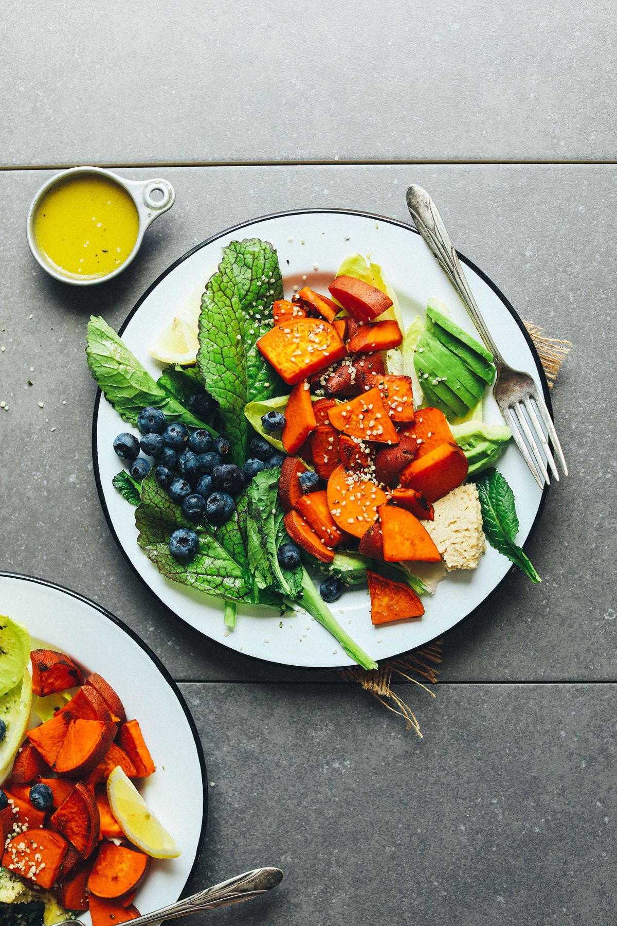 Delicious, gluten-free Savory Breakfast Salad on a plate with a fork.