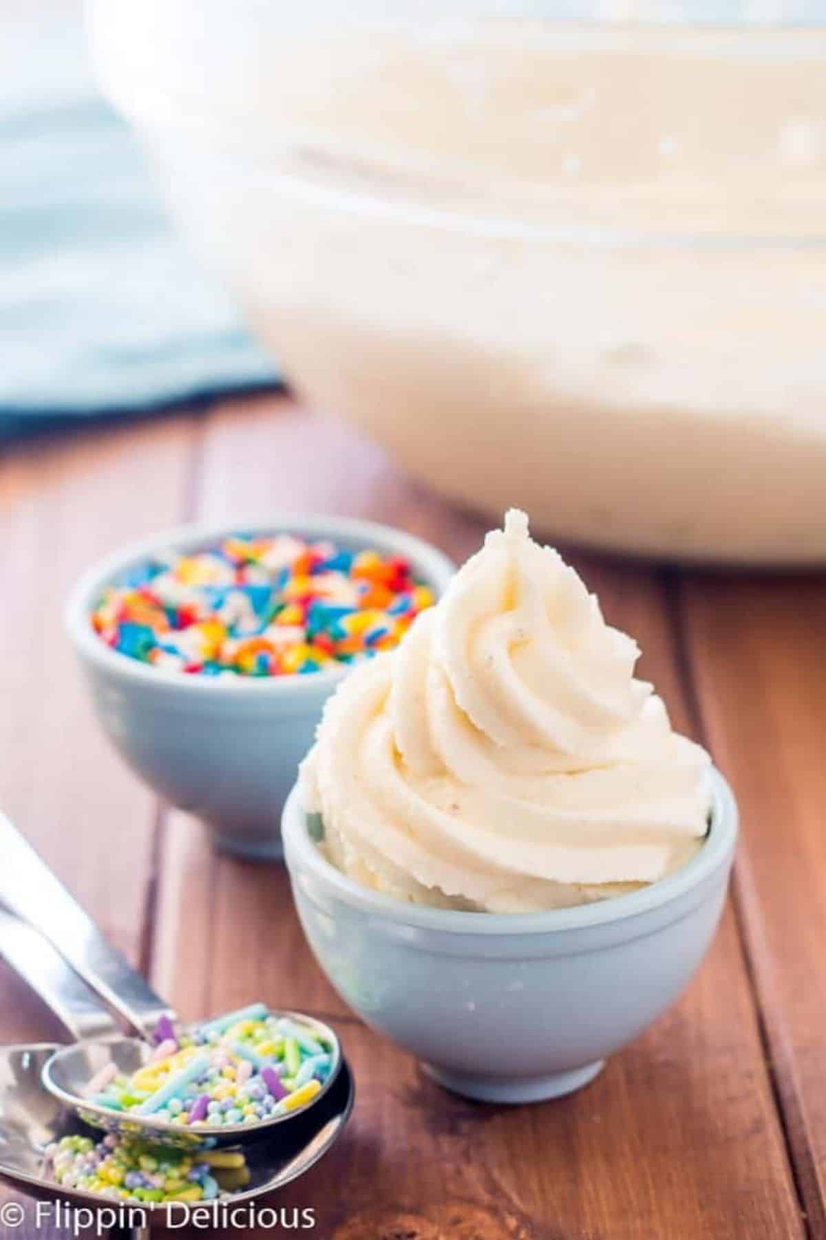 Tasty Vegan Buttercream Frosting in a small blue bowl.