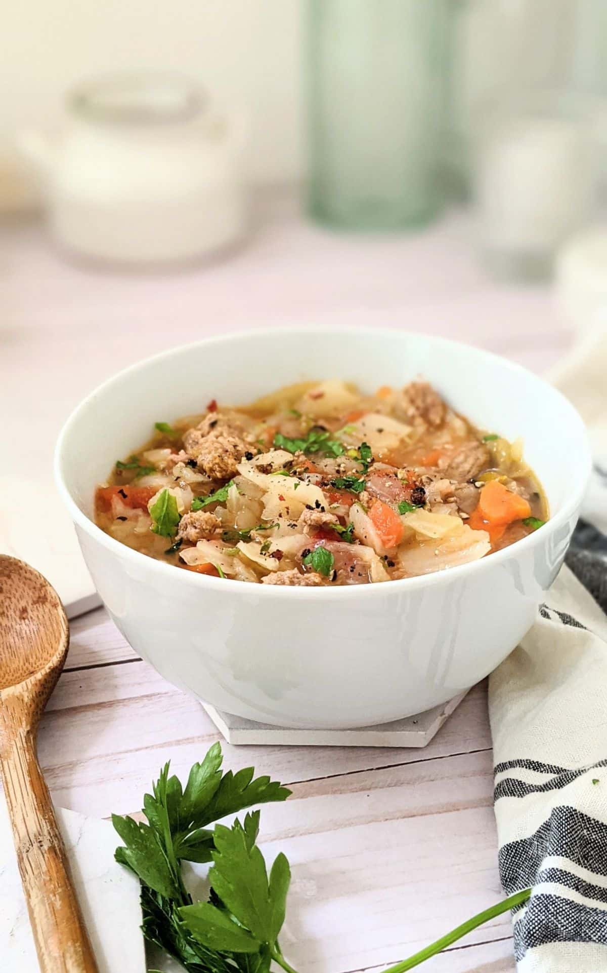 Delicious Instant Pot Turkey Cabbage Soup in a white bowl.