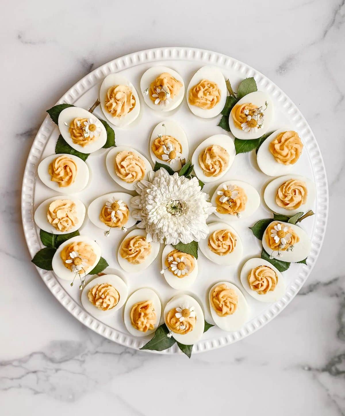 Healthy Classic Deviled Eggs on a white plate.