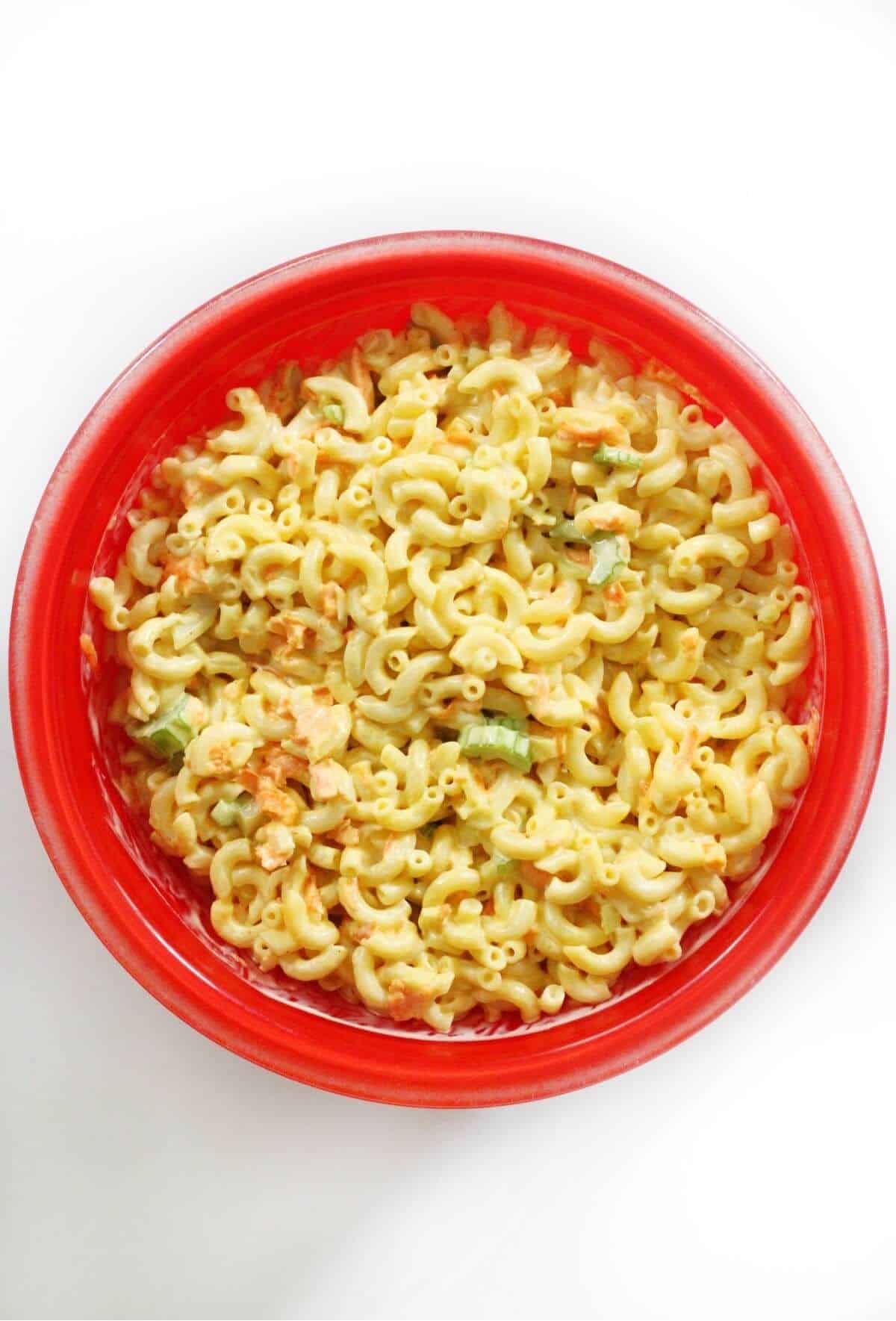 Flavorful Hawaiian Macaroni Salad in a red bowl.