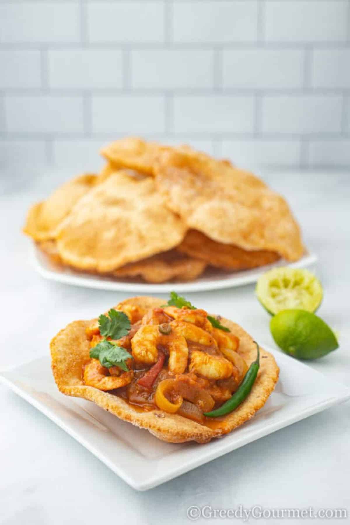 Crunchy Gluten-Free Puri on a white plate.