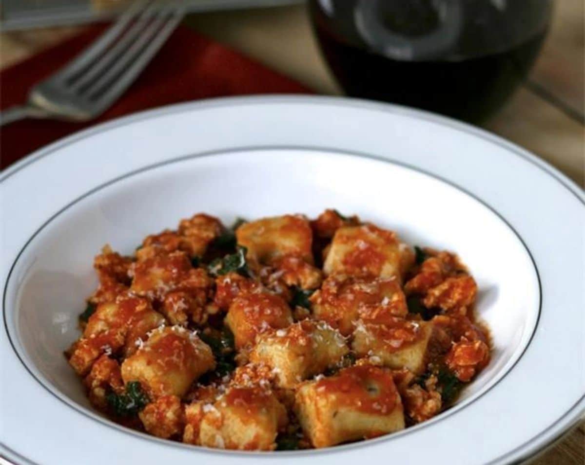 Healthy Gluten-Free Ricotta Gnocchi on a white plate.