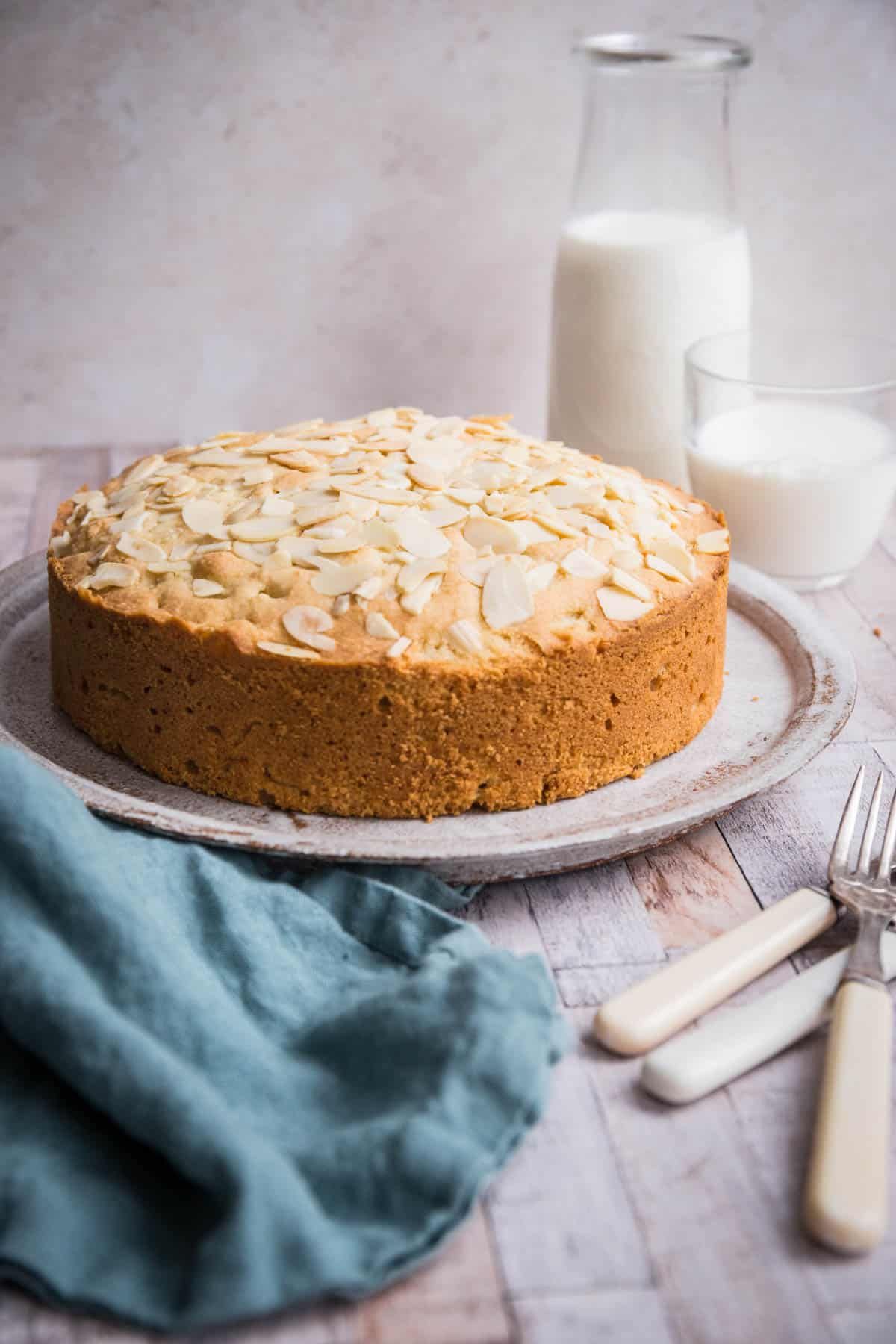 Flavorful Gluten-Free Pear and Almond Cake on a tray.