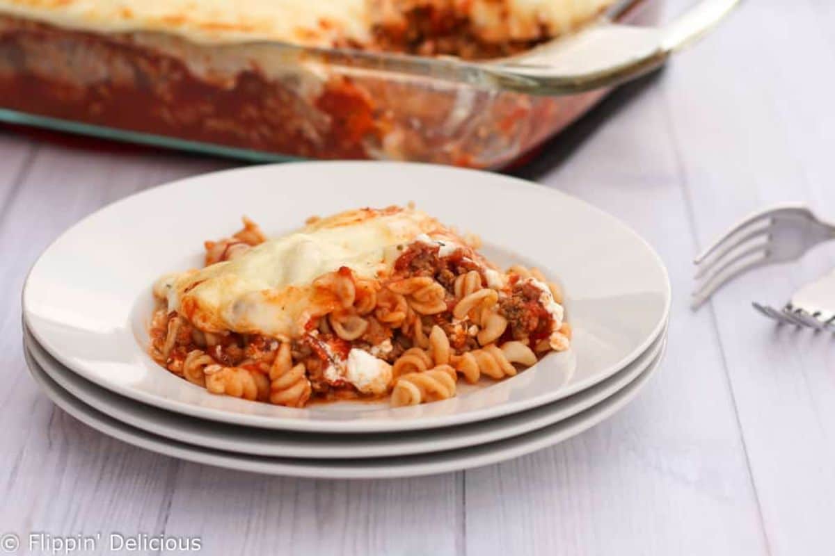 A piece of delicious Easy Gluten-Free Lasagna on a white plate.