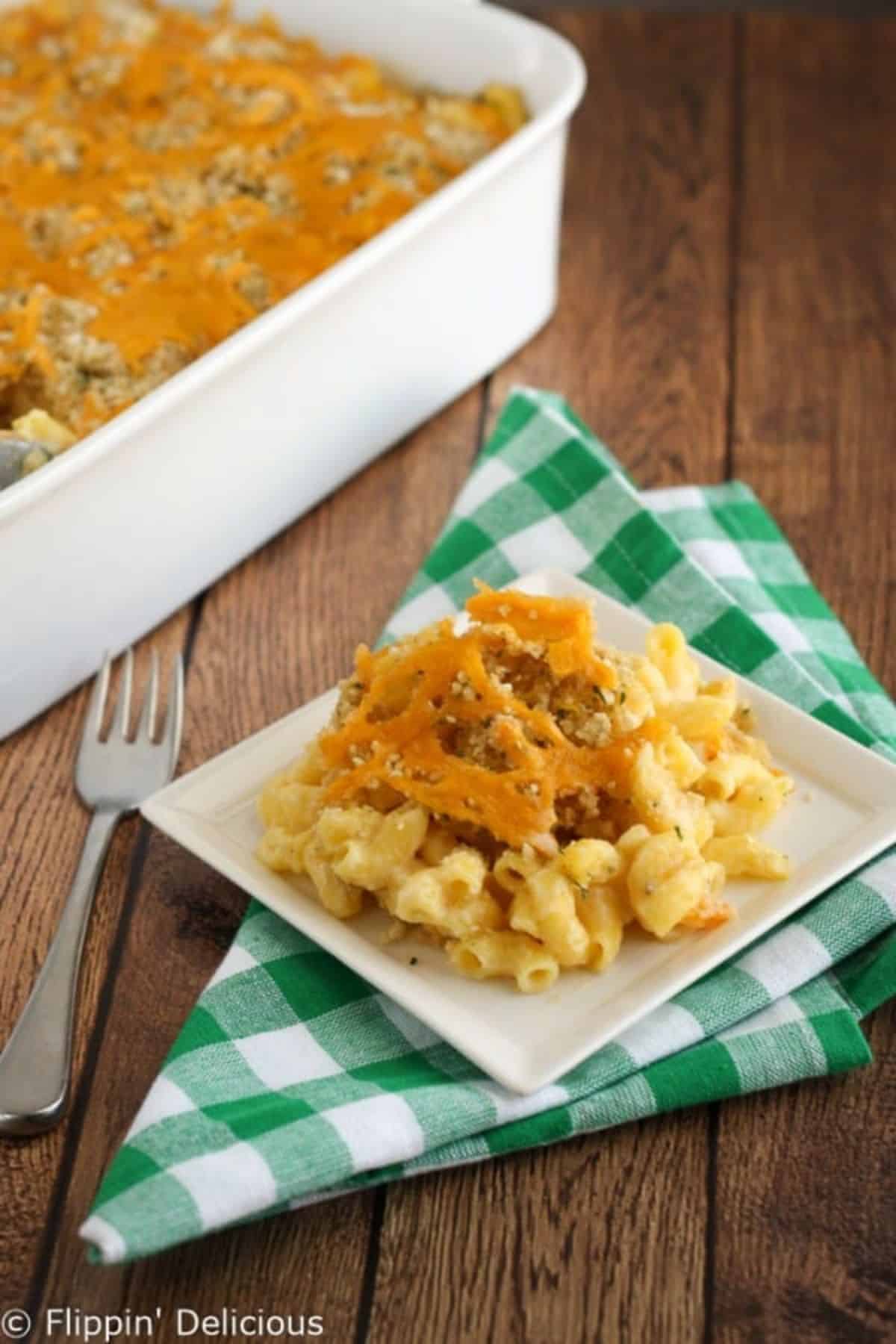 Scrumptious Baked Gluten-Free Mac and Cheese on a white plate.