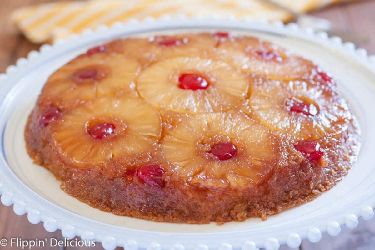 Mouth-watering Gluten-Free Pineapple Upside-Down Cake on a cake tray.