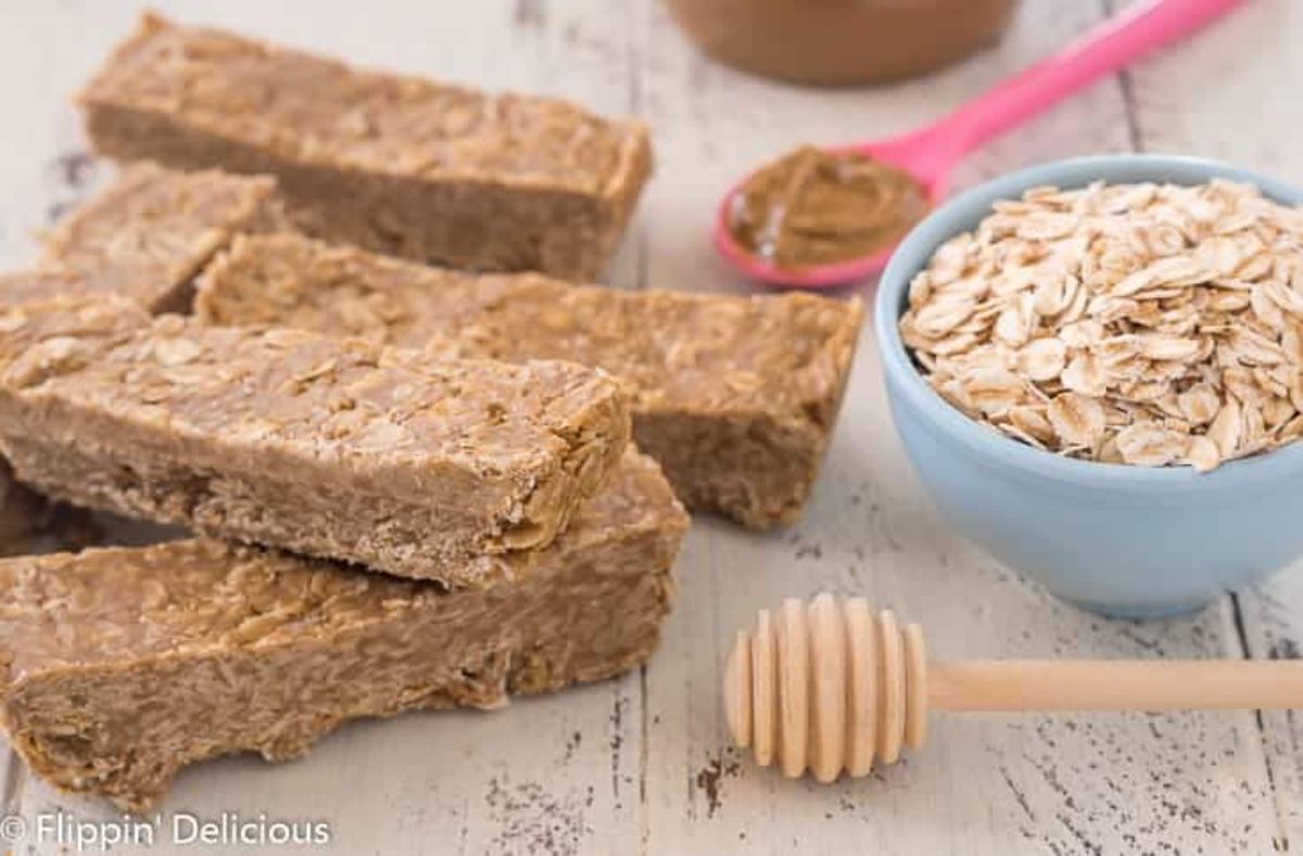 Healthy Gluten-Free SunButter Honey Granola Bars on a wooden table.