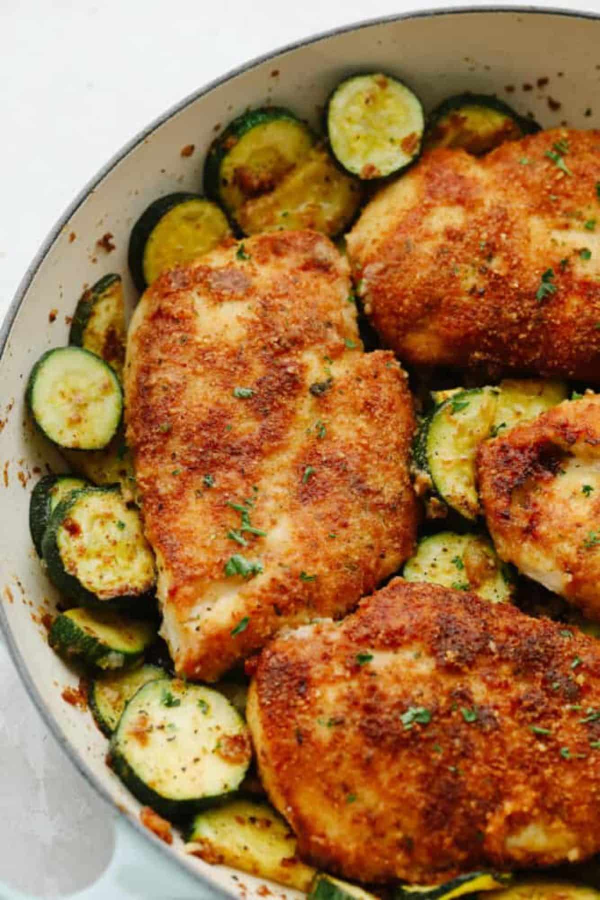 Crispy Parmesan Garlic Chicken With Zucchini in a bowl.