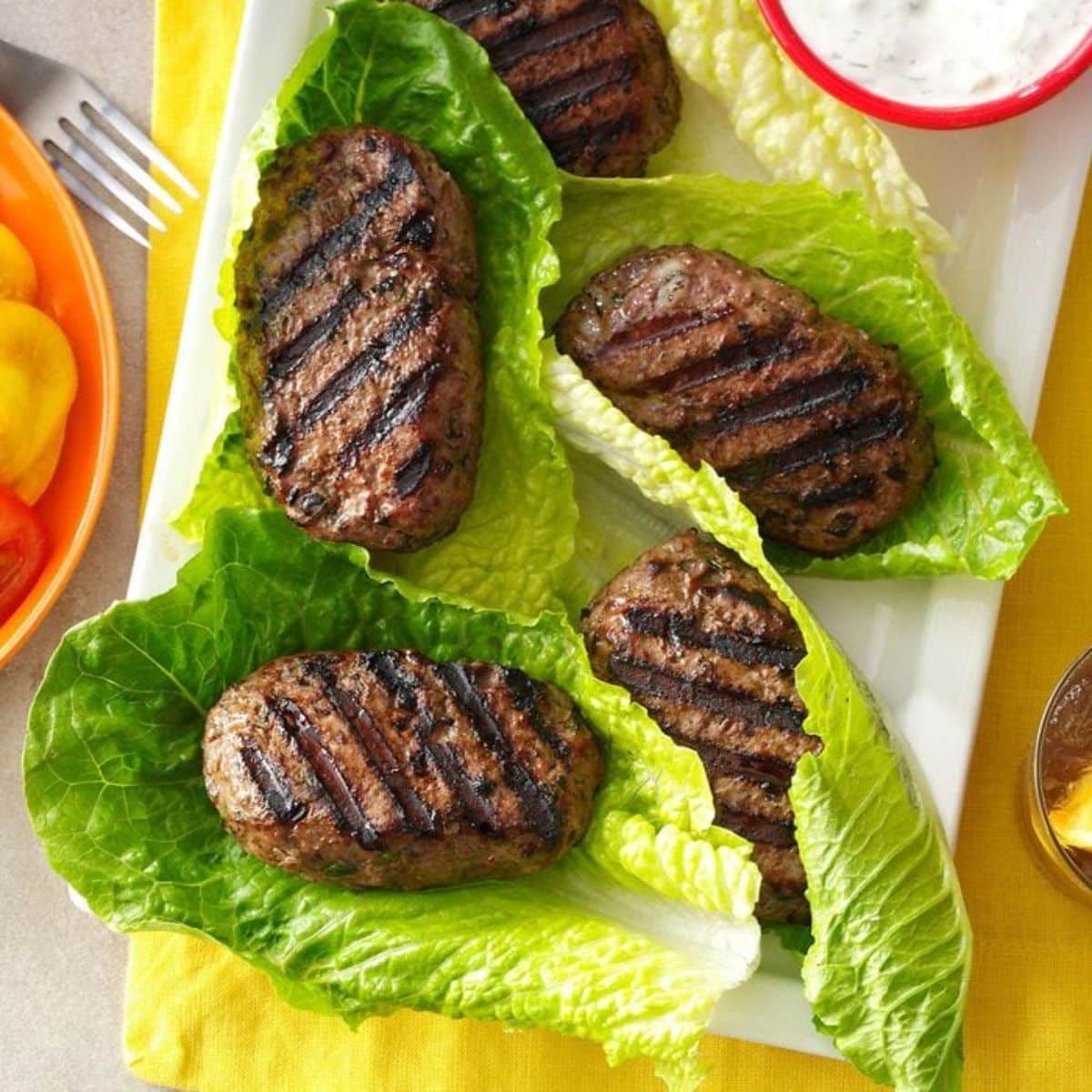 Juicy & Delicious Mixed Spice-Burgers on a white tray.