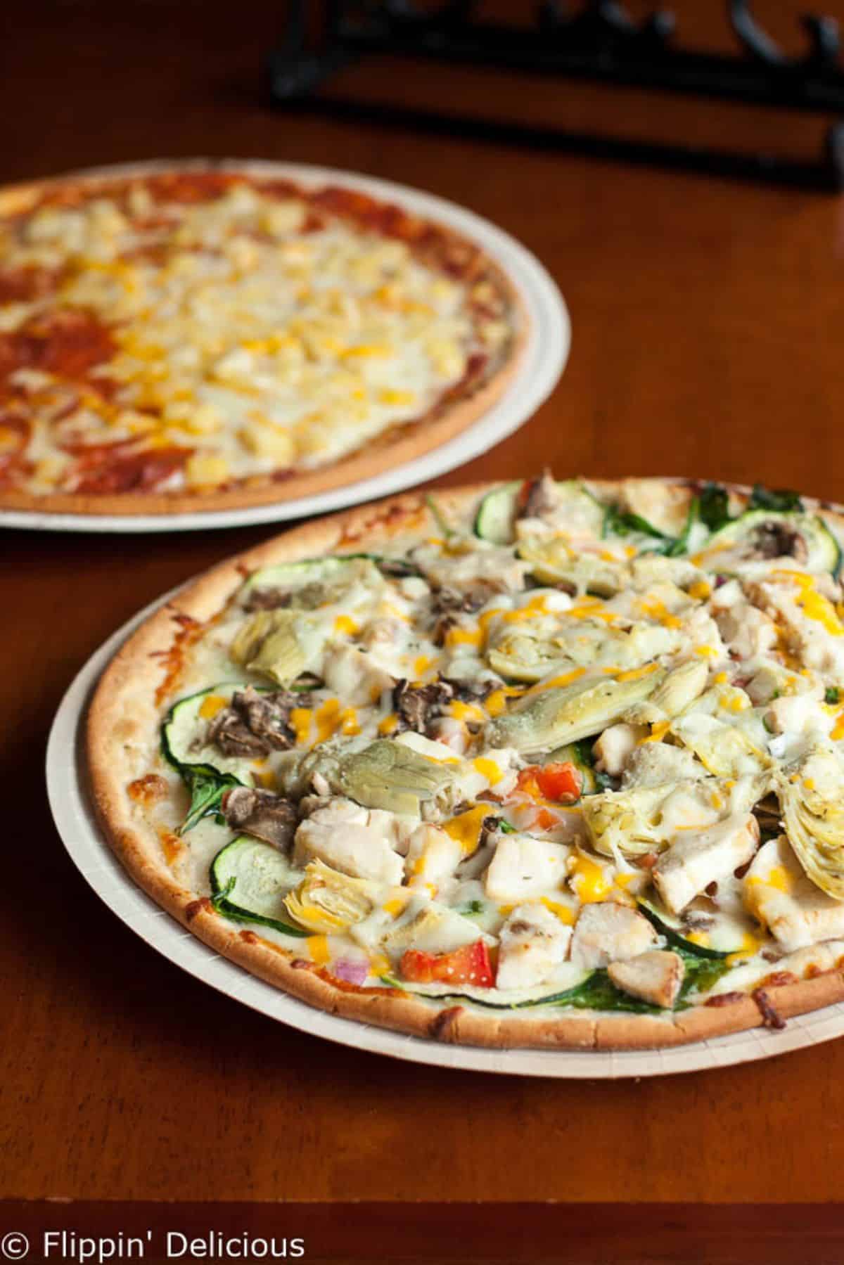 Delicious Gluten-Free Pizza on a white tray.