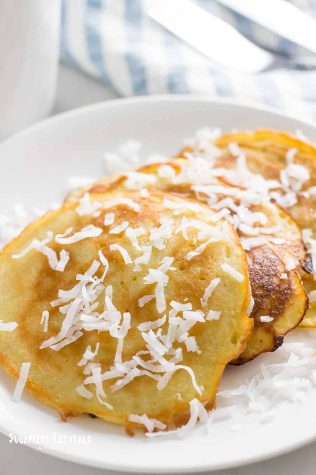Healthy Coconut Milk Pancakes on a white plate.