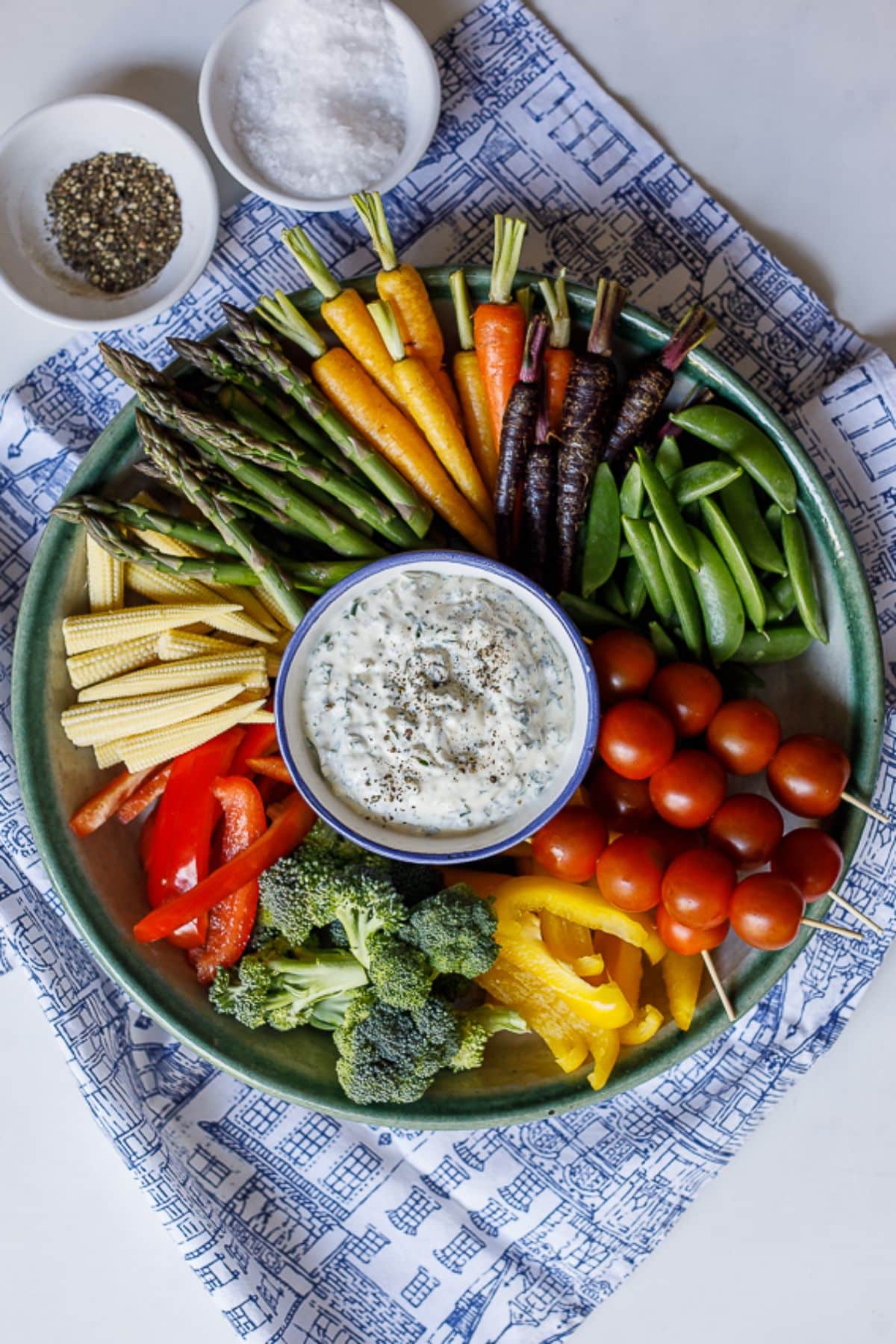 Crudite Platter with Sour Cream Dip in a bowl with veggies.