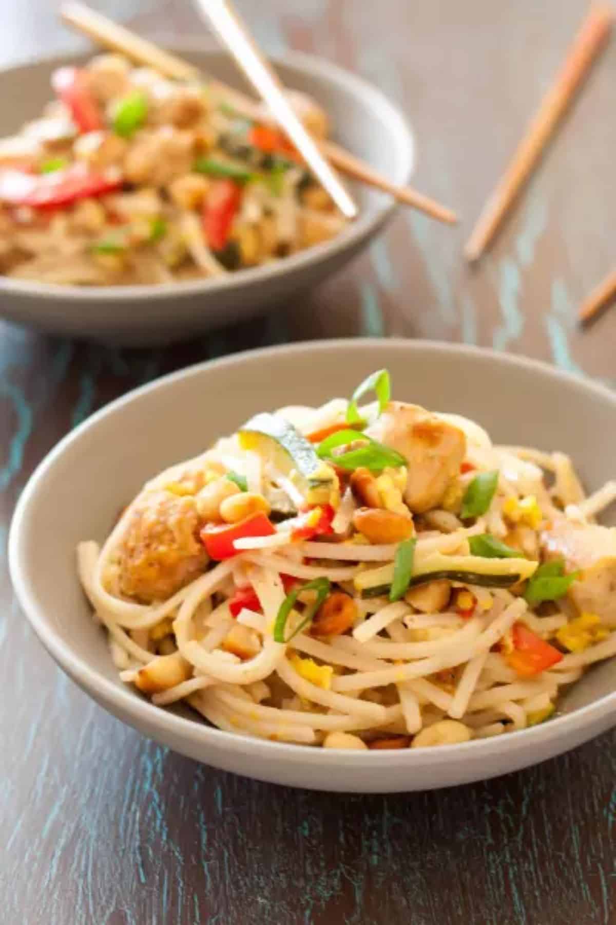 Healthy Gluten-Free Pad Thai in two gray bowls.