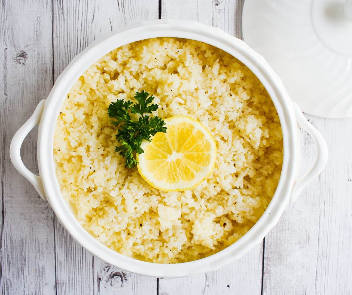Flavorful Low-FODMAP Lemon Rice in a white pot.