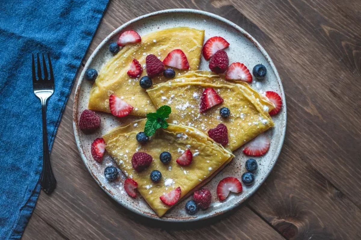 Delicious Tapioca Flour Crepes with fruits on a plate.