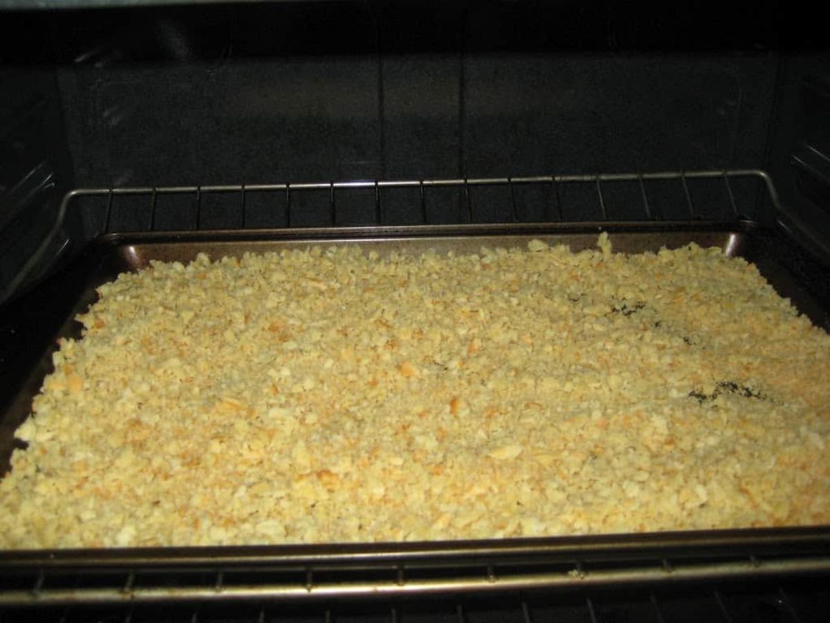 Waffle-Based Bread Crumbs on a baking tray in the oven.